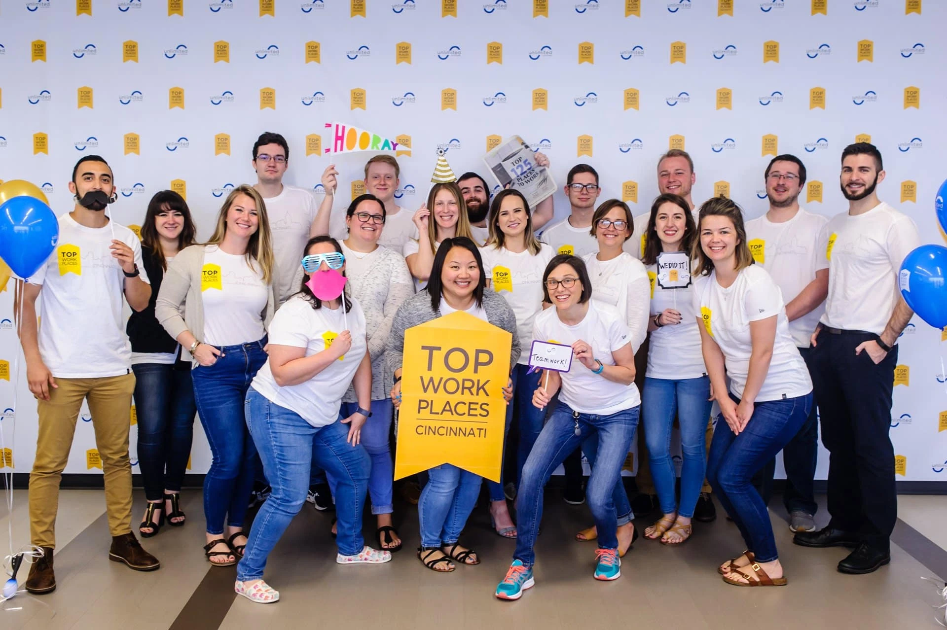 Unlimited Systems employees celebrating their Cincinnati Top Workplaces recognition