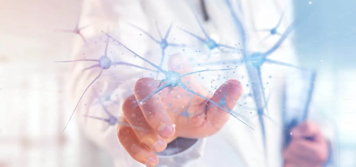 Clinician's hand beneath a digital illustration of connected neurons