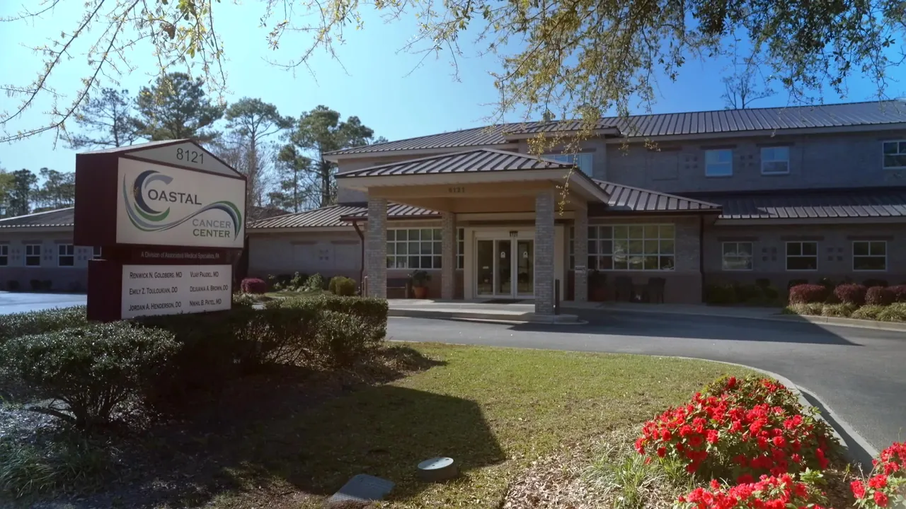 The entrance and sign of Coastal Cancer Center in Myrtle Beach, South Carolina